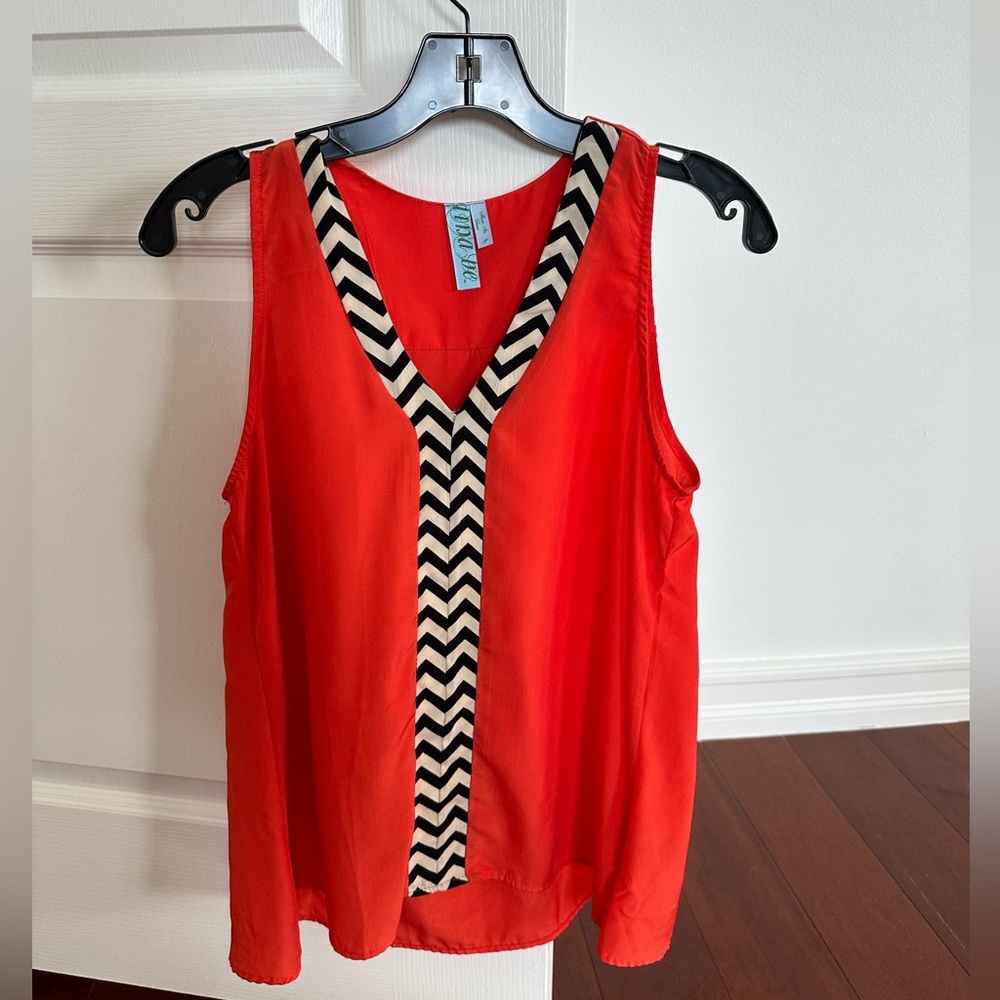 Women’s orange top size small